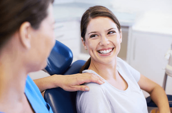 Happy woman not afraid of dentist - Dentist in Fairview