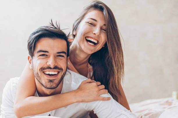 Young Adult Couple Smile