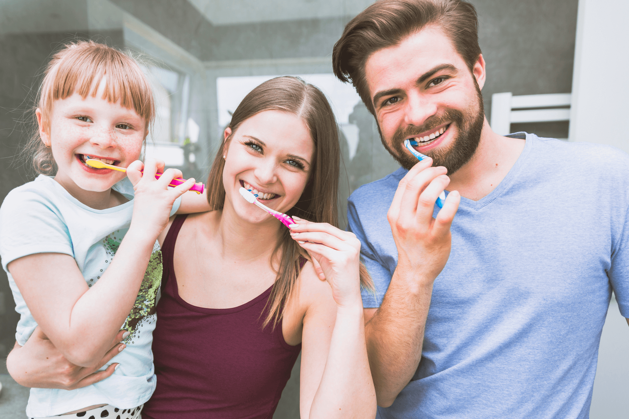 beautiful-family-brushing-teeth