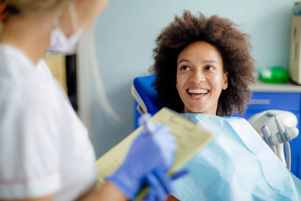 Woman teeth cleaning dentist